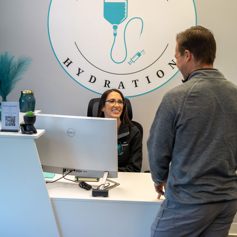 Vital Hydration of Knoxville, TN front desk with male patient checking in