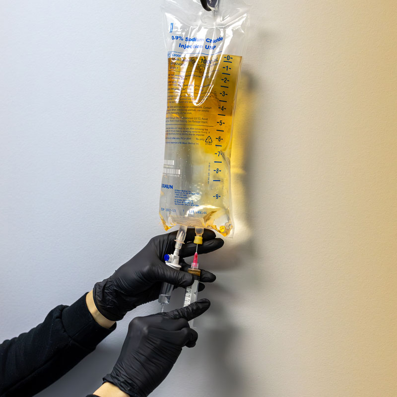 IV drip having vitamins injected at Vital Hydration of Knoxville, TN